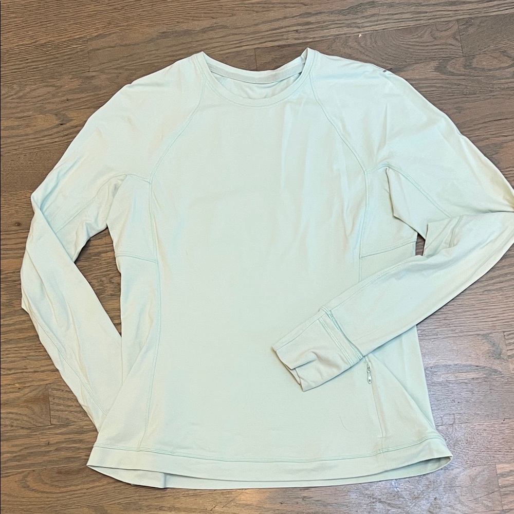 It’s Rulu Lon-Sleeve Shirt.  Mint green Size 10.